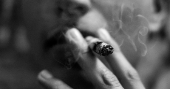 men smoking a cigarette 